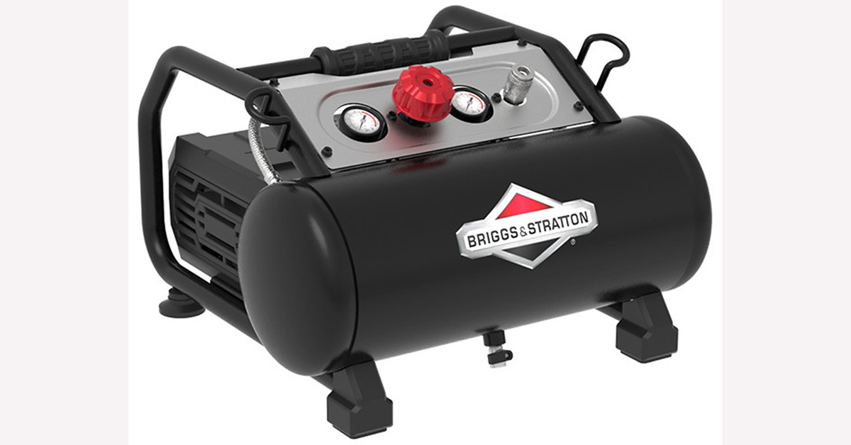 A black and silver air compressor

Description automatically generated